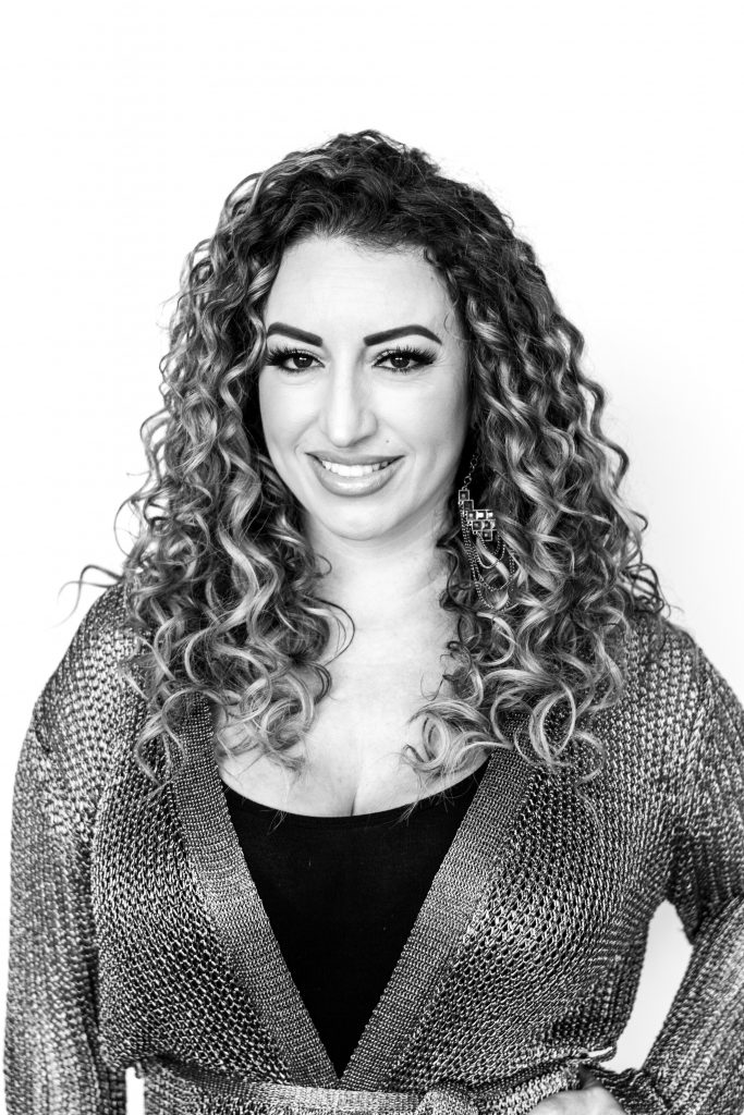 Karina is an Executive Stylist who specializes in curly hair at changes salon and day spa