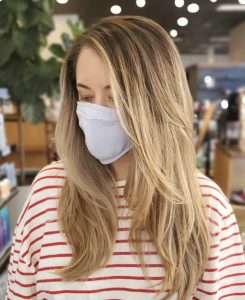Client at Changes hair salon wearing a mask