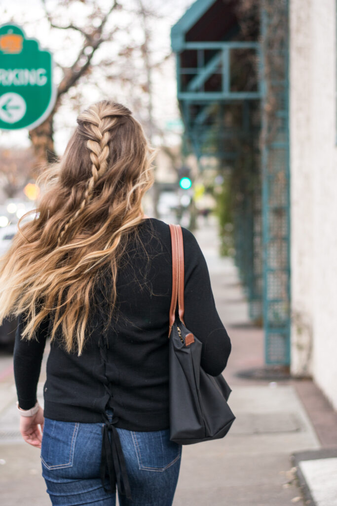 woman with unwashed hair styled nicely