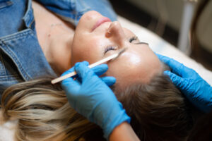 woman having hair removal waxing service at changes salon and day spa