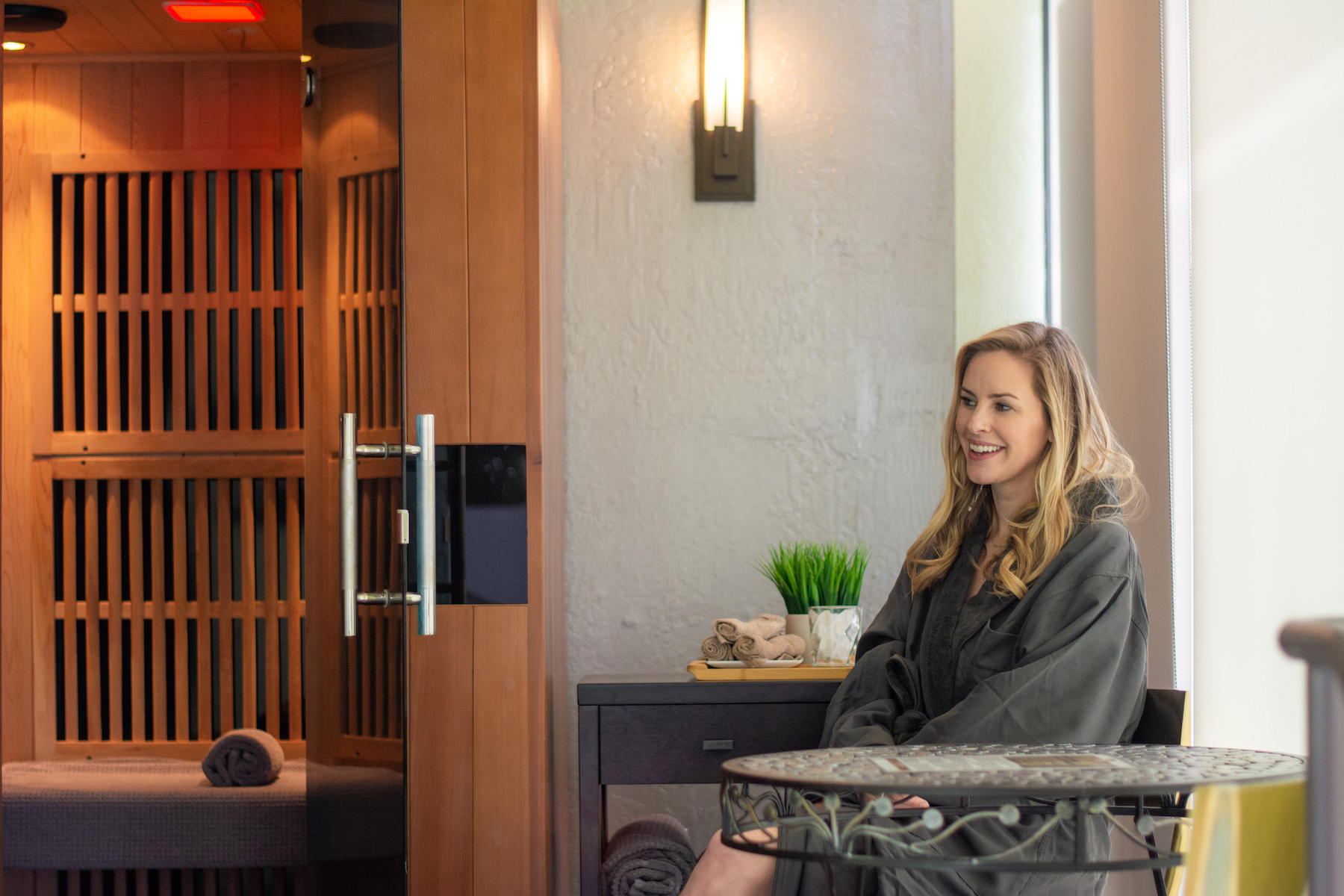 Woman preparing to enjoy the infrared sauna walnut creek spa changes