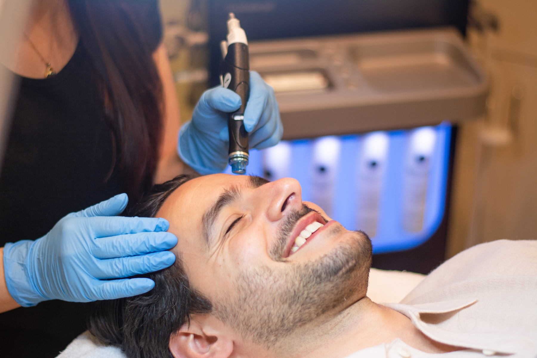 Man enjoying a hydrafacial from the menu of services changes salon day spa walnut creek