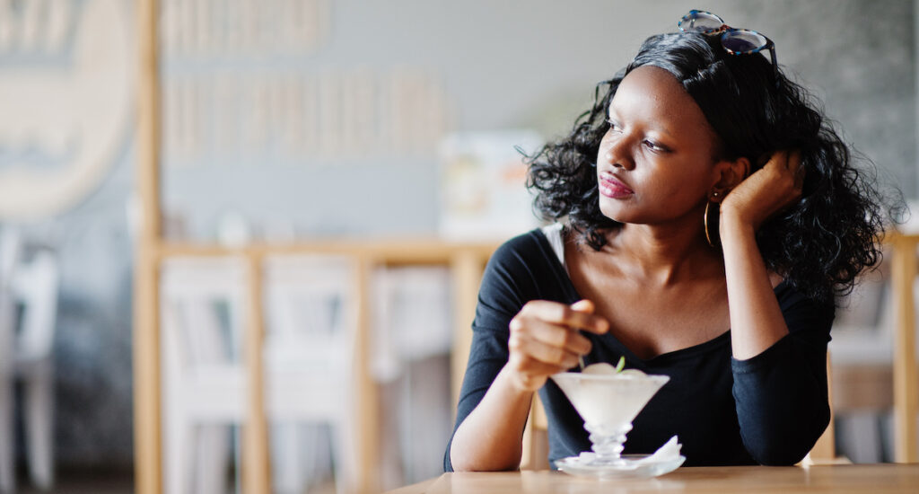 Woman taking time for self care by eating out in downtown walnut creek.