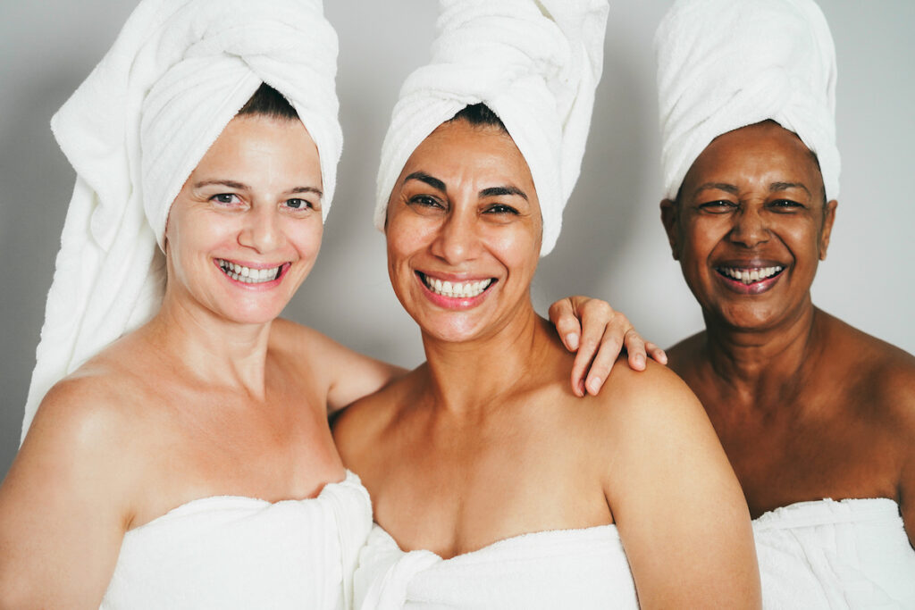 Mature women laughing together while at changes salon and day spa