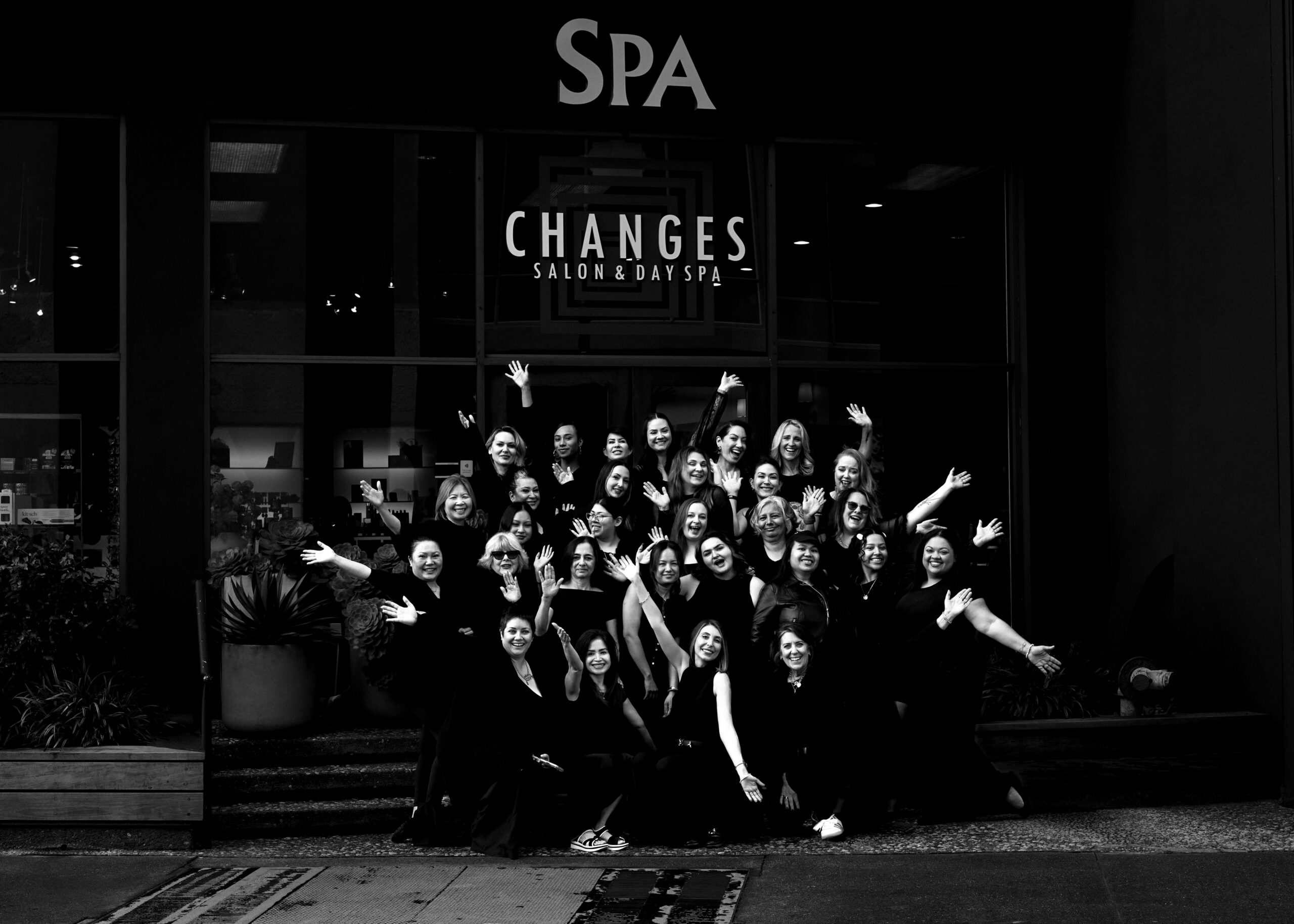 group shot team changes 2026 black and white
